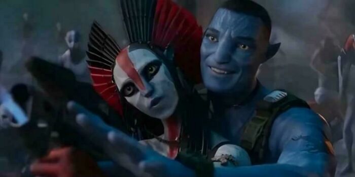 Two blue-skinned characters from a movie scene, illustrating hilariously absurd movie and TV details made up yet accurate.