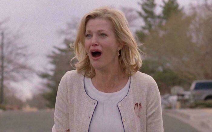 Woman in a distressed scene from a movie, illustrating hilariously absurd movie and TV details that appear made up yet accurate.