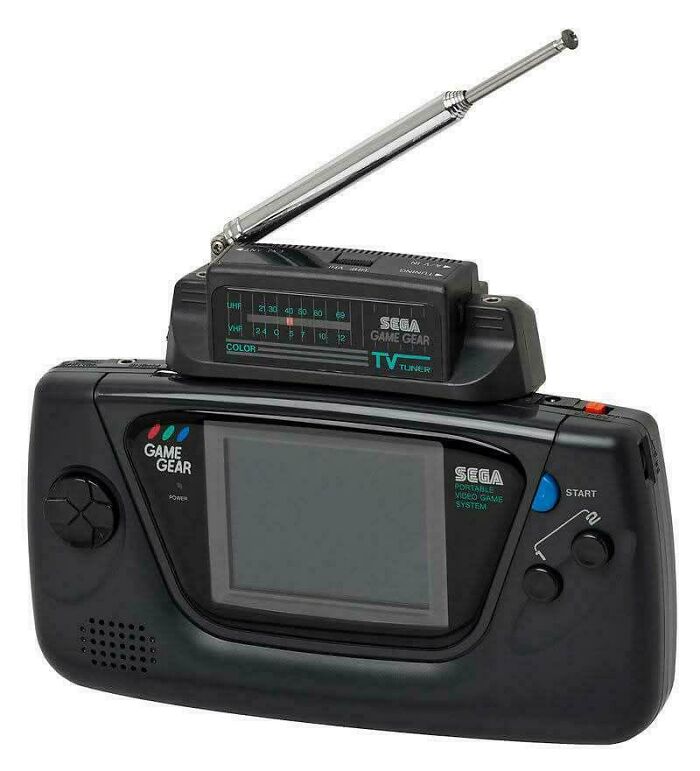 Vintage Sega Game Gear handheld console with TV tuner attachment, a popular gadget from the 90s childhood era.