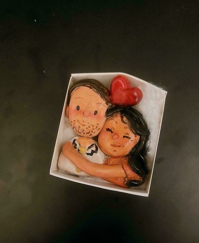 Handmade DIY figurine of couple embracing with a red heart, showcasing creative DIY wins and healing through crafts.
