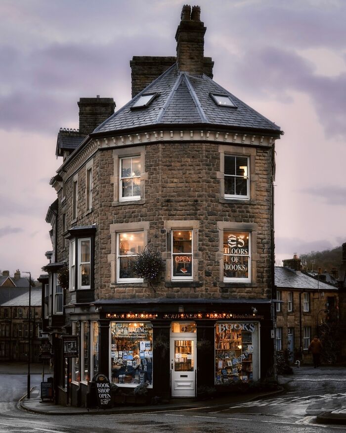 Beautiful architecture of a charming old building housing a bookstore on a quaint street.