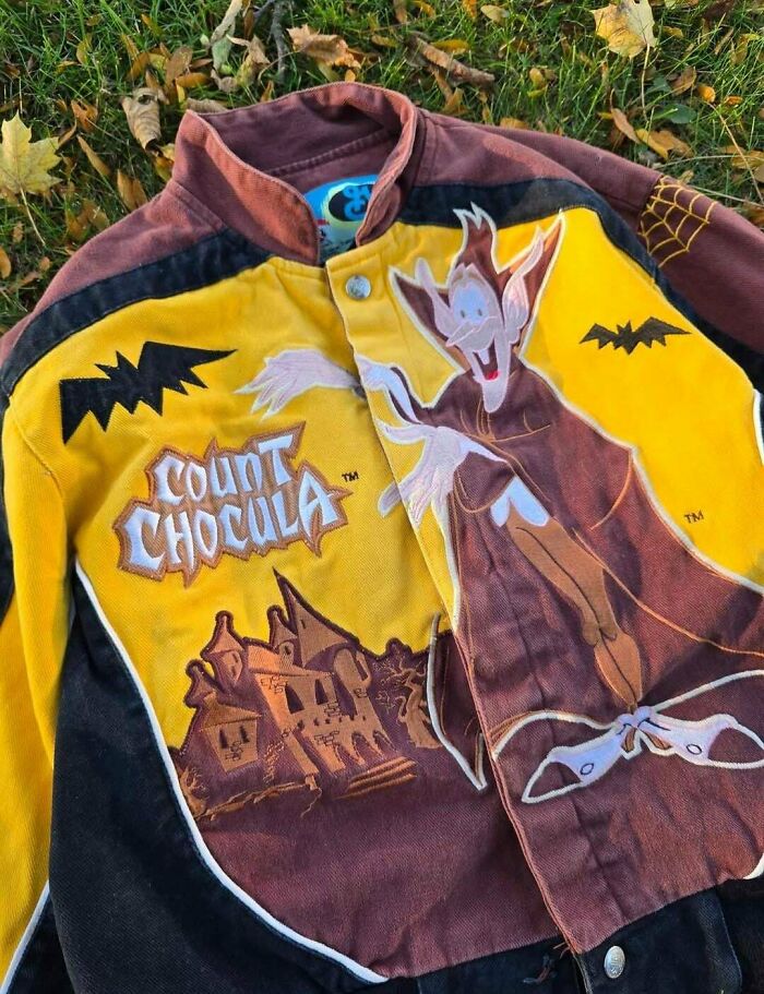 Vintage Count Chocula jacket found in a thrift store, showcasing unique retro design and graphic art on fabric.