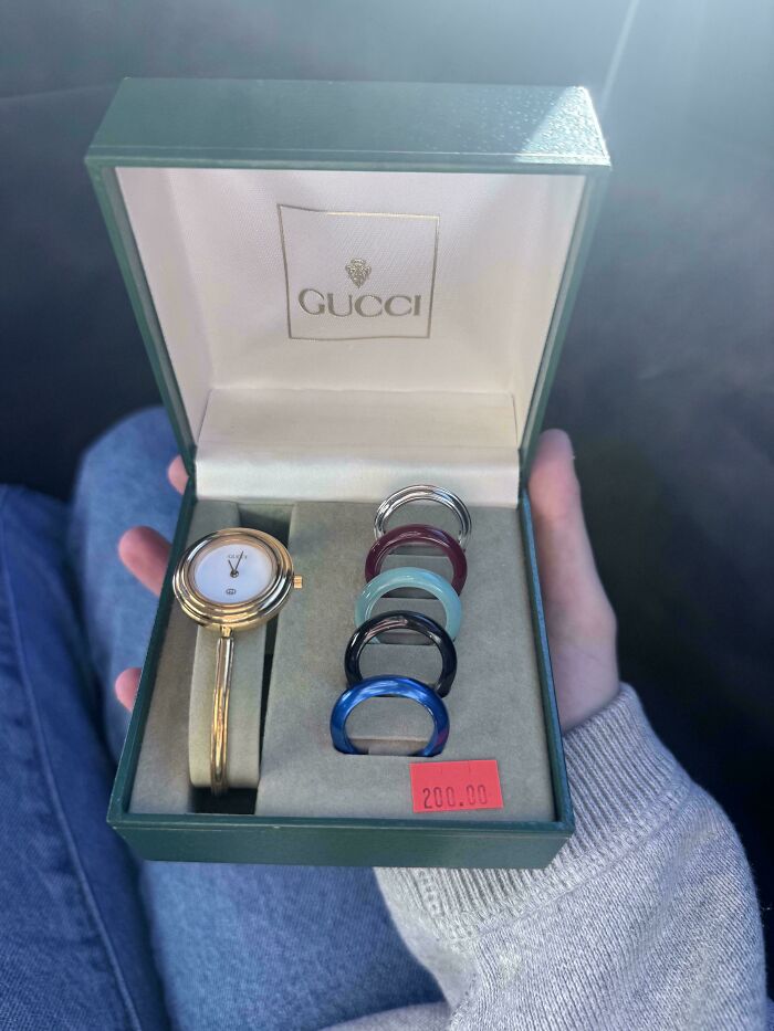 Gucci watch with multiple colorful interchangeable bezels in original box, a prized thrift store find valued at 200 dollars.