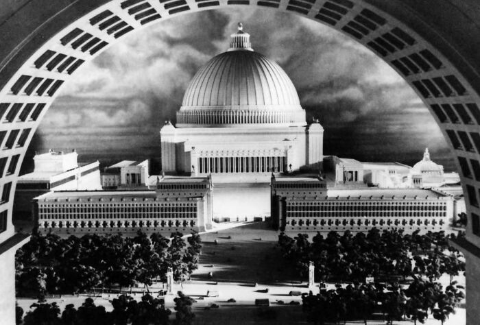 A grand, domed building surrounded by trees, appearing to be built for an evil mastermind.
