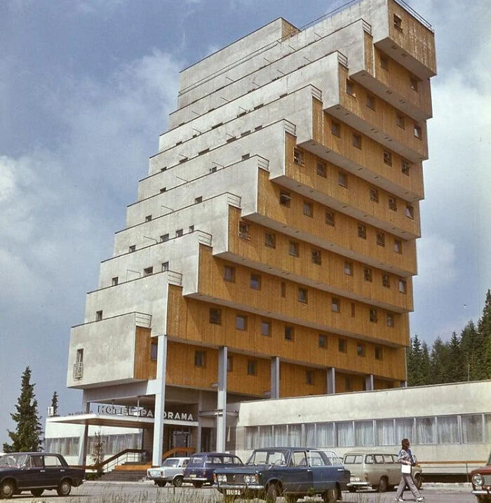 A striking, modern building with an intriguing, stepped facade, resembling structures built for an evil mastermind.