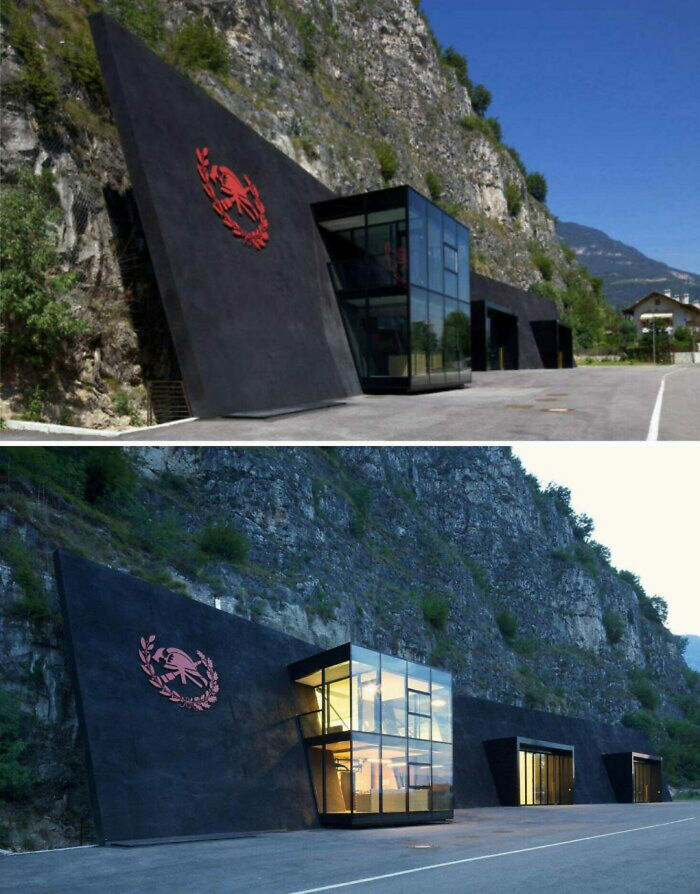 A building integrated into a mountain, featuring a red emblem, ideal for an evil mastermind's secret plans.