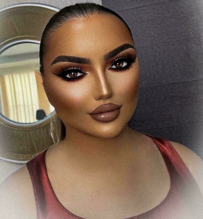 A woman with heavily contoured makeup, an unnatural look for social media.