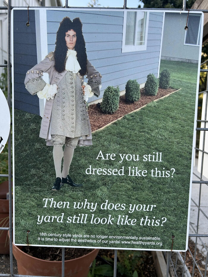 Sign showing a person in 18th century clothing with a message about bizarre and hilarious yard signs you don’t see every day.