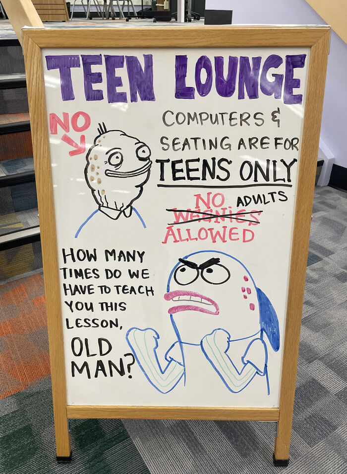 Funny and bizarre sign at a teen lounge humorously banning adults from using computers and seating, featuring cartoon characters.