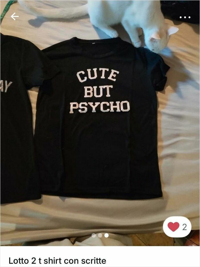 White cat next to a black t-shirt with the words cute but psycho, highlighting cats in Vinted ads.