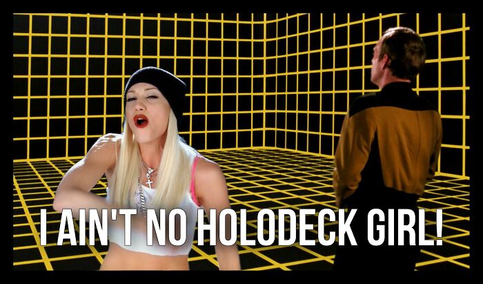 A woman in a beanie and crop top raps in a grid-patterned sci-fi room with text referencing a holodeck meme.