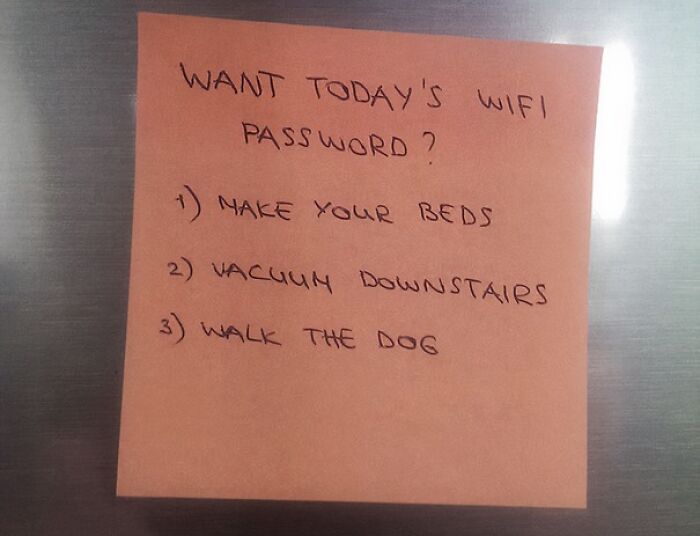 Sticky note with a creative and amusing note left by parents listing chores to get the WiFi password for the day