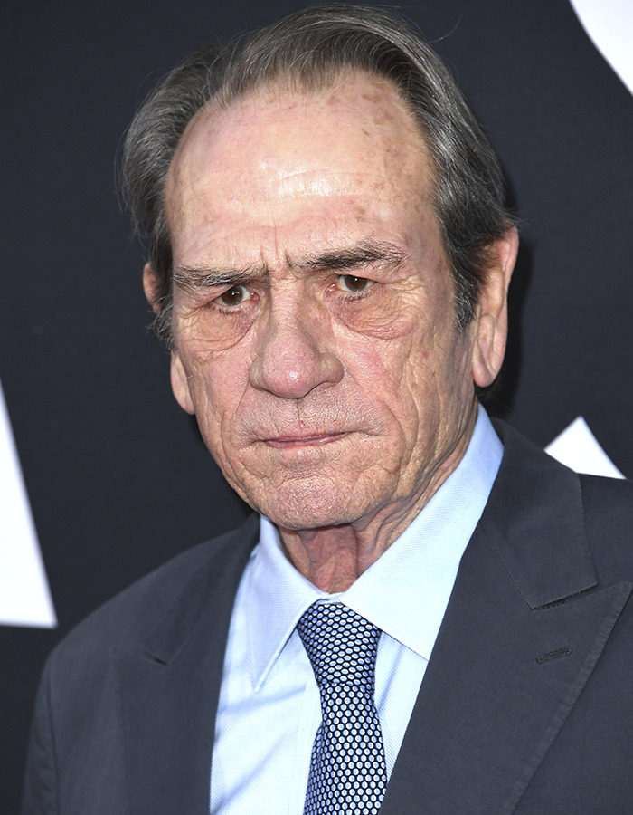 Tommy Lee Jones at a formal event, wearing a suit and tie, with court records revealing daughter Victoria&rsquo;s pending plea deal.