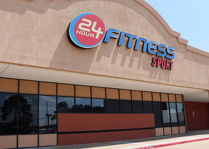 Exterior view of 24 Hour Fitness gym where jealous girlfriend allegedly threw 25-pound weight at rival during fight.