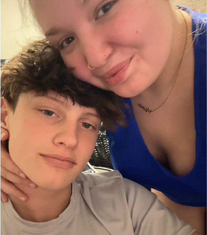 Teen siblings posing closely, illustrating family impact as 15-year-old gets pregnant with 12-year-old's child.