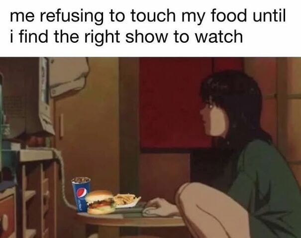 Person sitting on floor staring at TV with food on table, relatable meme about finding the right show to watch before eating.