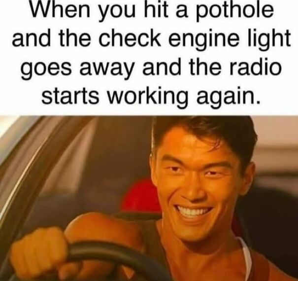 Man smiling while driving a car with meme text about hitting a pothole and a car radio working again relatable meme.