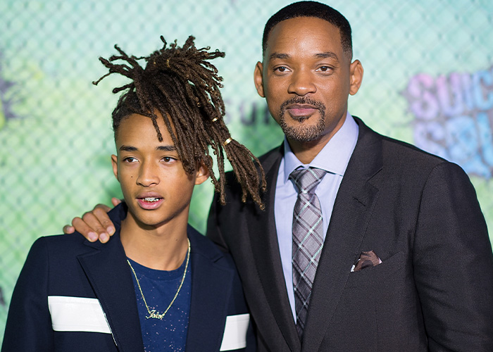 Jaden Smith and Will Smith posing together at a formal event, highlighting Black Brooklyn Beckham debate. Jaden Smith and Will Smith posing together at a formal event, highlighting Black Brooklyn Beckham debate.