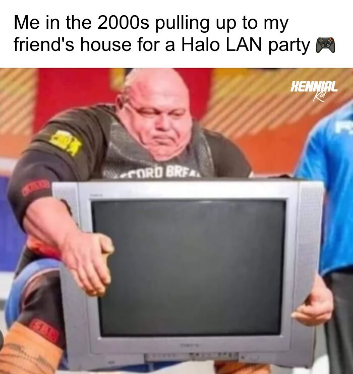Strongman lifting a heavy old CRT TV, capturing nostalgic moments for xenials with retro tech and memories.