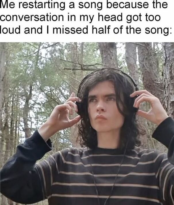 Person outdoors in a striped shirt putting on headphones, relatable meme about restarting a song due to distracting thoughts.