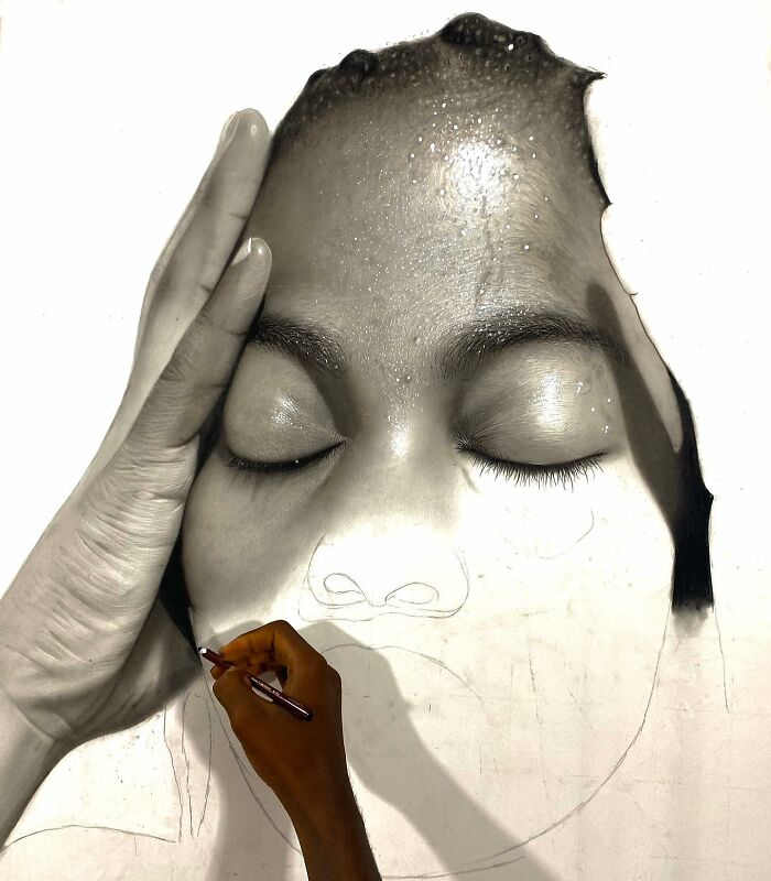 Artist creating a hyperrealistic portrait with detailed shading showing the process behind hyperrealistic portraits.