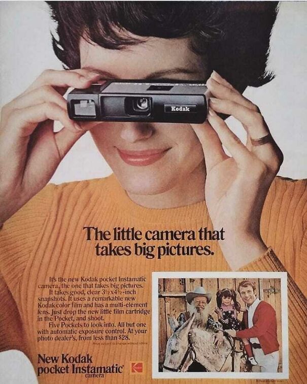Woman holding vintage Kodak camera up to her eyes in a retro ad showing changing values in vintage ads over time.