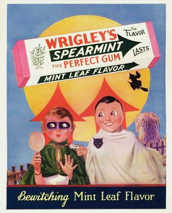 Vintage ad for Wrigley's Spearmint gum showing children in Halloween costumes promoting mint leaf flavor.