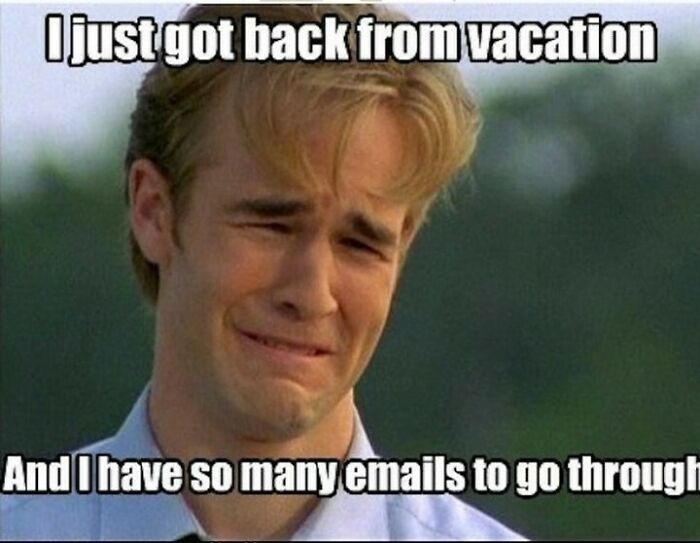 Young man making a funny frustrated face with caption about travel memes and vacation email overload.