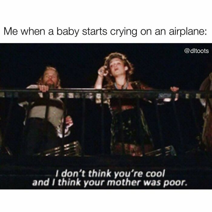 Two people standing behind a railing with a caption about babies crying on airplanes in a hilarious travel meme.