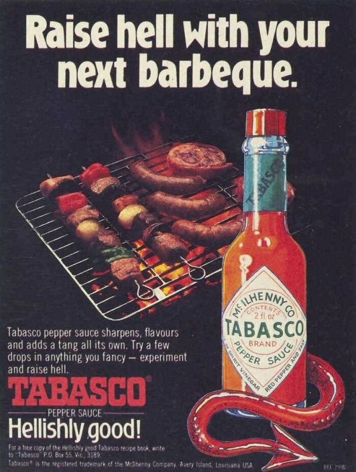 Vintage Tabasco pepper sauce ad with barbeque grill, sausages, and bold text promoting its sharp, flavorful taste.
