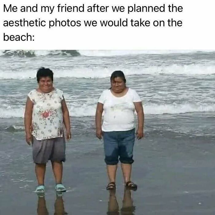 Two women standing at the beach with casual clothes, illustrating relatable memes about life as an introvert.