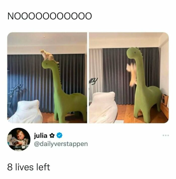 Cat meme showing a cat falling off a large green dinosaur statue with caption about having eight lives left.