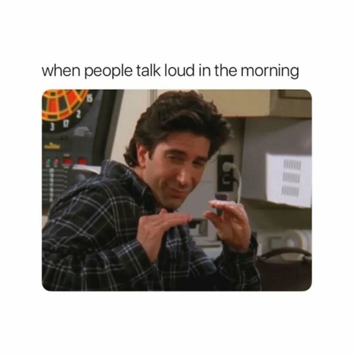 Ross from Friends making a face and gesturing quietly, illustrating a meme about loud morning talk in Friends memes.