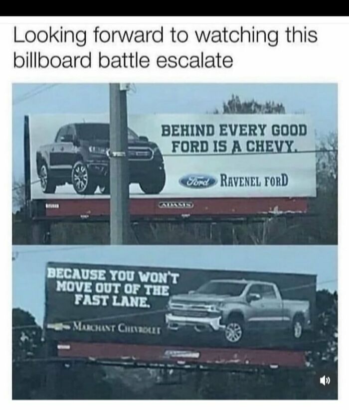 Billboard battle meme featuring humorous Ford and Chevy truck ads in a random memes collection.
