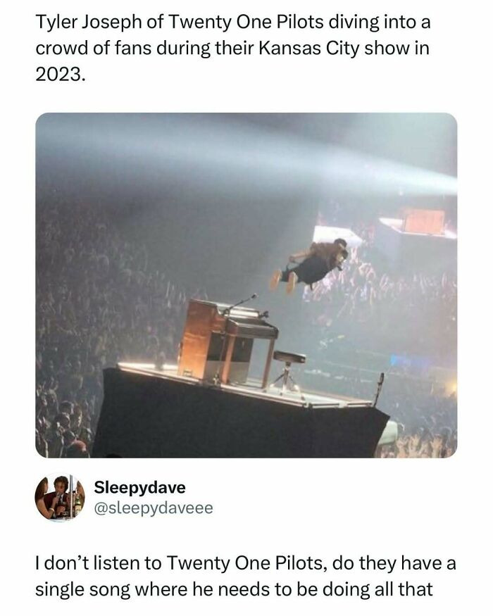 Crowd surfing musician at a concert, an entertaining post capturing a lively moment to help fight boredom with memes.