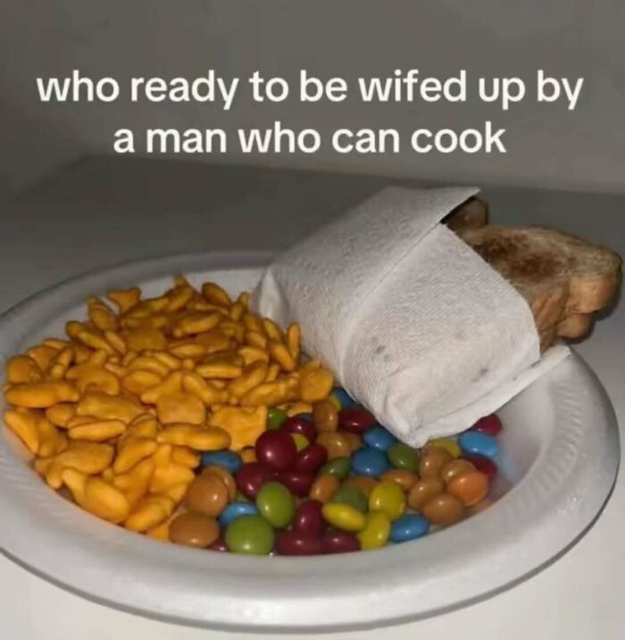 Random and bizarre meme showing a paper plate with snacks and a sandwich wrapped in a napkin, highlighting cooking humor.