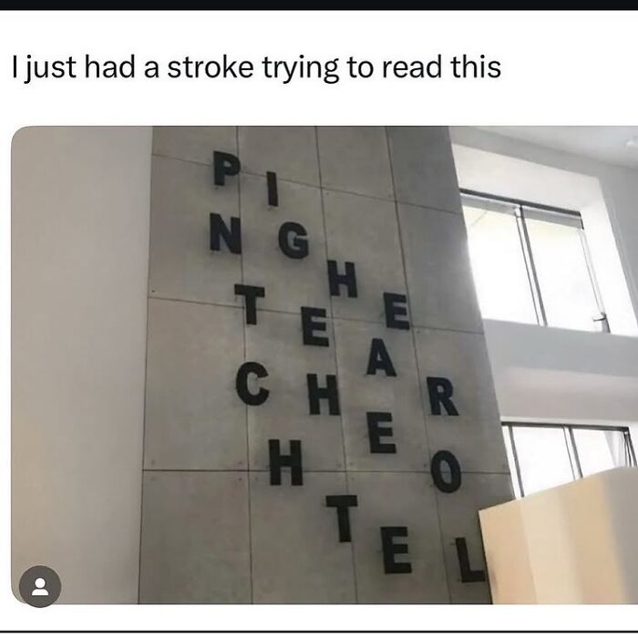 Confusing letter arrangement on a wall making it hard to read, featured in random memes that are unexpectedly funny.