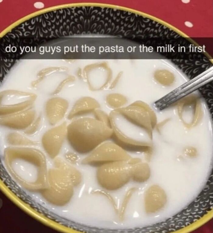 Bizarre meme showing pasta shells in milk with a caption asking if pasta or milk goes in first, highlighting random humor.