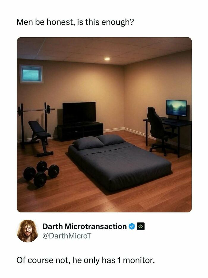 Minimalist room with a mattress, single monitor, workout bench, and dumbbells illustrating entertaining posts and memes about boredom.