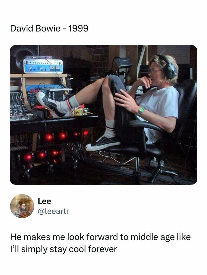 David Bowie relaxing in studio with headphones on, illustrating entertaining posts and memes to help fight boredom.
