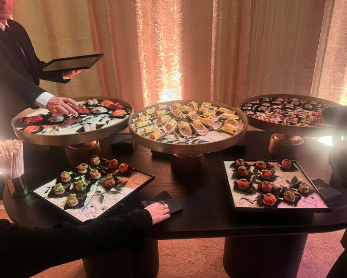 Golden Globes food display featuring sushi and appetizers served on trays, available to order on DoorDash delivery. Golden Globes food display featuring sushi and appetizers served on trays, available to order on DoorDash delivery.
