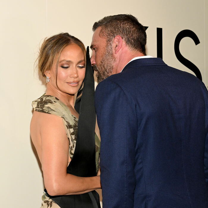 Jennifer Garner and Ben Affleck interact closely at an event, highlighting her trauma bonded feelings post-divorce.