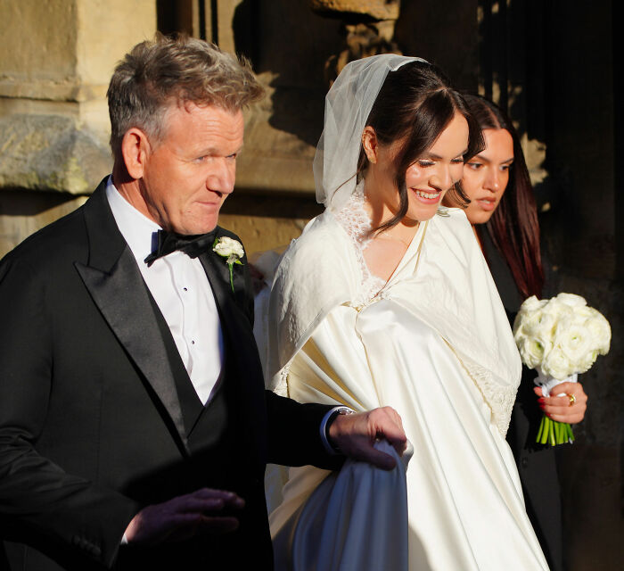 Groom Adam Peaty changes name after wedding to Gordon Ramsay&rsquo;s daughter while ex responds to the controversy.