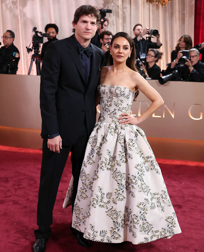 Ashton Kutcher's rough look and Mila Kunis posing together on the red carpet at the Golden Globes event