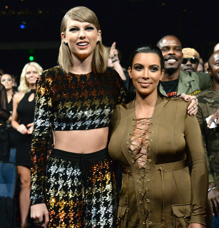 Taylor Swift and Kim Kardashian attending an event together, sparking speculation amid Blake Lively text reveal. Taylor Swift and Kim Kardashian attending an event together, sparking speculation amid Blake Lively text reveal.