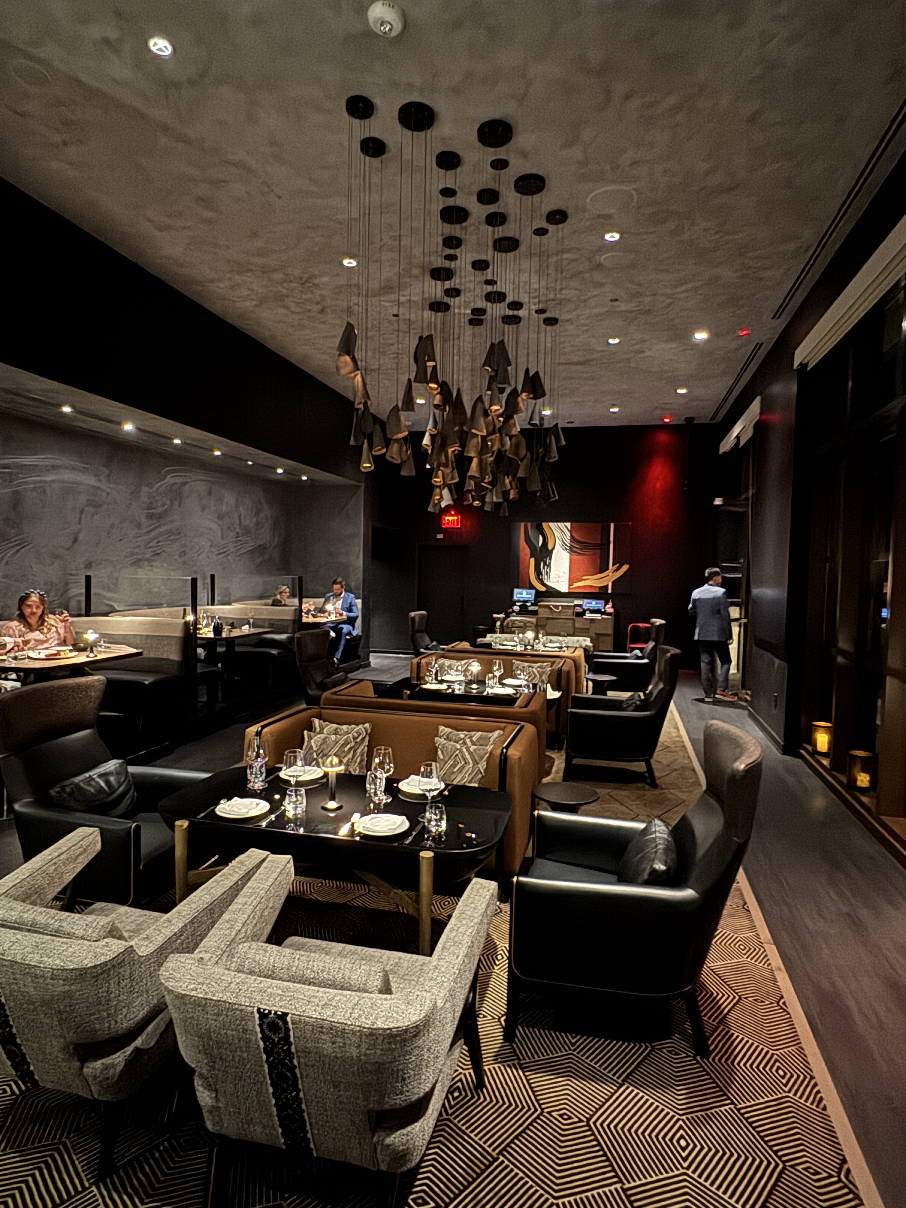 Elegant Central Florida dining room with silence, beauty, and calm atmosphere, showcasing cozy seating and modern lighting.