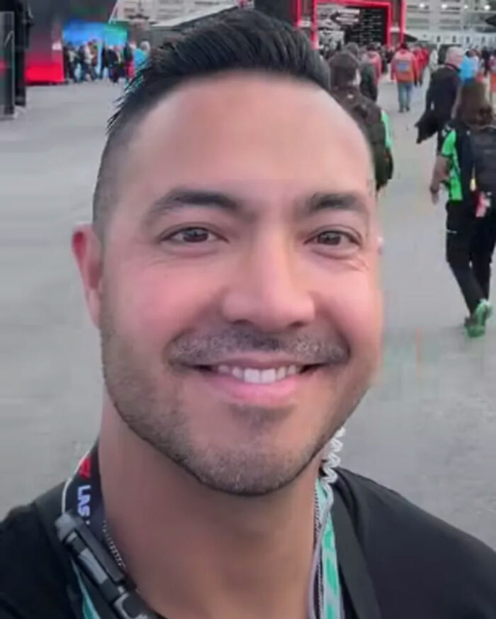 Close-up of a smiling man at an outdoor event, related to marine veteran's heartbreaking final text and tragic meetup.