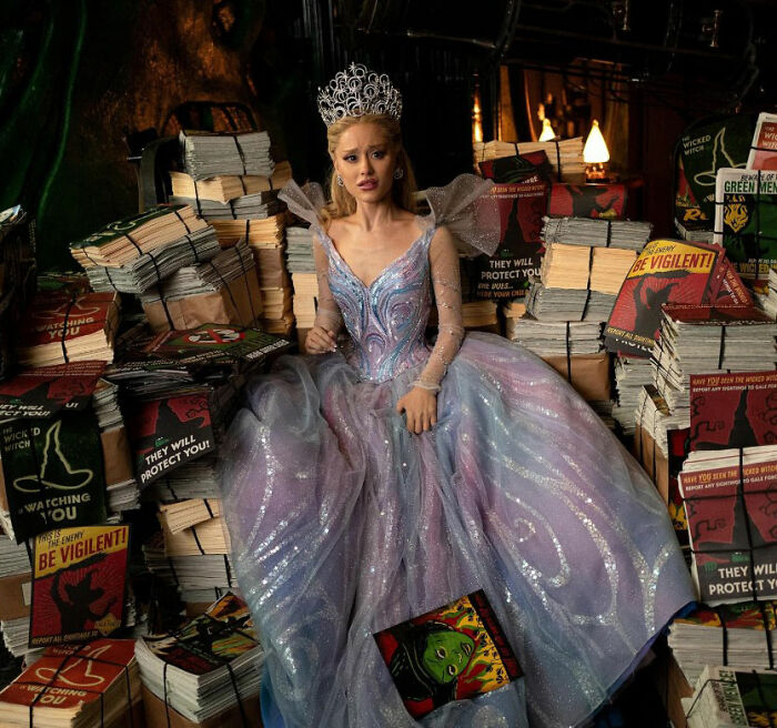 Actress in an elaborate gown and crown surrounded by stacks of books, representing Academy releases 2026 Oscar nominations. Actress in an elaborate gown and crown surrounded by stacks of books, representing Academy releases 2026 Oscar nominations.