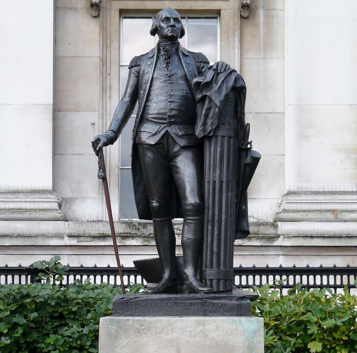 Statue of George Washington outside a historic building, representing lesser-known facts about countries and history.