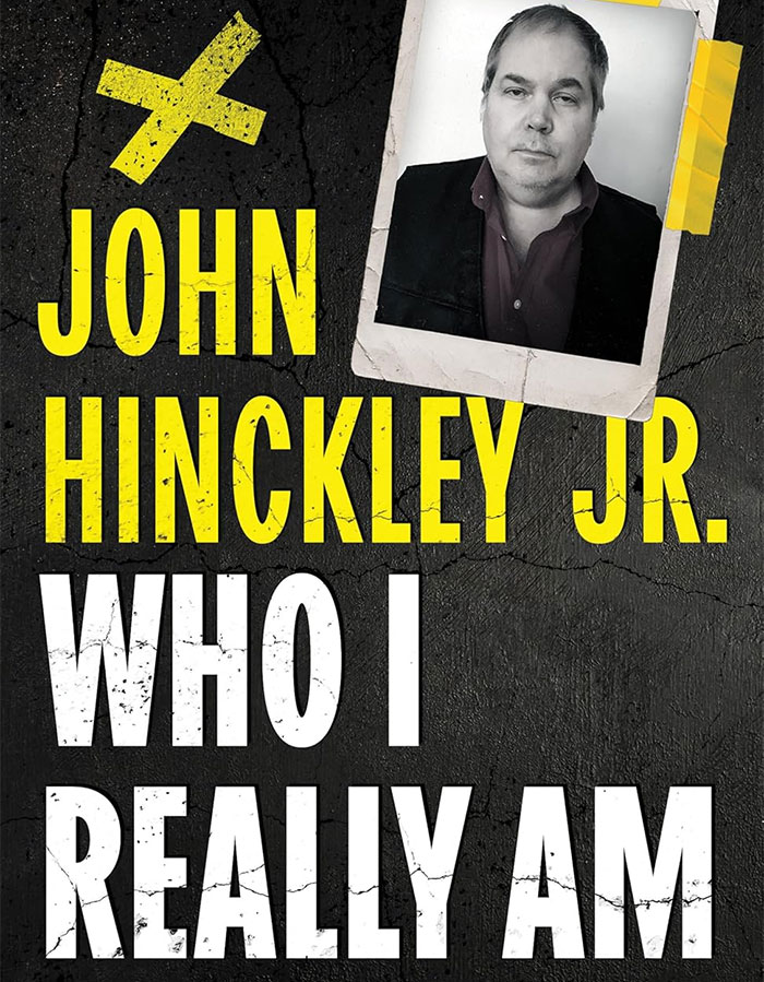 Black and white portrait photo of a man pinned with tape on a dark c*****d wall, related to Hollywood predators topic.